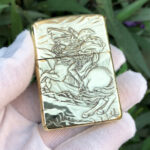 Napoleon brass Zippo Armor lighter engraving close-up