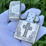 Open front view of the Holy Bible cross sterling silver Zippo Armor lighter