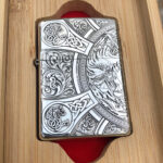 Front view of the Four Horsemen of the Apocalypse engraved sterling silver Zippo lighter