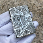 Angled front view showing horsemen panels, knotwork, and scroll engraving