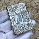 Reverse view of the Four Horsemen sterling silver Zippo lighter with rider and ornamental panels