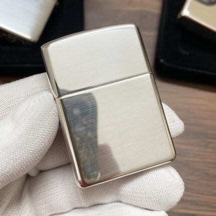 Zippo #26 high-polish sterling silver Armor lighter, front view