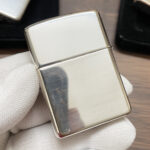Reflective reverse face of the Zippo #26 sterling silver Armor lighter
