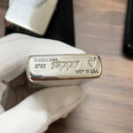 Sterling silver and Armor bottom stamp on the Zippo #26 lighter