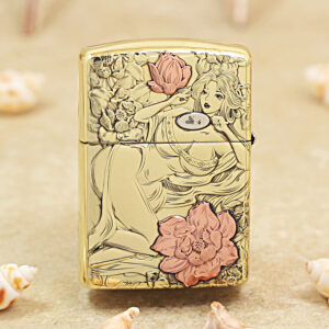 KZ456-01 Gold decorative lighter featuring line-art of a reclining woman among pink flowers, on a metallic surface.