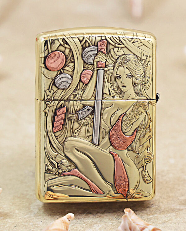KZ457-01 Gold Zippo lighter with an intricate engraving of a reclining woman, a vertical sword, and a dragon motif in a fantasy scene.