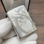 Tree of Life relief across the sterling silver Zippo Armor case, angled view