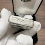 Sterling silver and Armor bottom stamp on the Tree of Life Zippo lighter