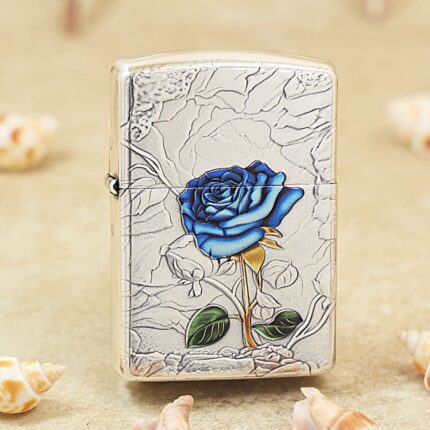 Blue Enchantress Rose silver-tone Zippo Armor lighter on cracked-metal background