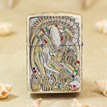 H.R. Giger Alien Zippo Armor lighter biomechanical engraving close-up