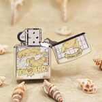 Open Tom and Jerry Zippo Armor lighter showing engraved cartoon panels