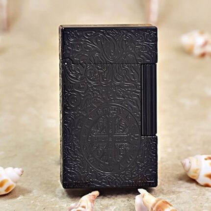 Karl Wieden KW-T0208D petrol lighter, front view showing black Constantine cross medallion and flowing scroll ornament