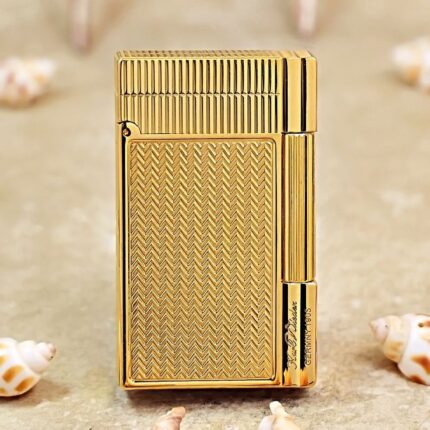 Karl Wieden KW-T02P petrol lighter, front view showing gold-plated wave panel, grooved lid and branded side section