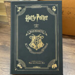 KZ476 silver-tone Magic Academy lighter displayed with the themed notebook