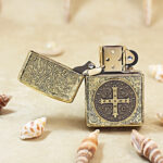 KZ499 open lighter showing brass cross medal and windproof insert