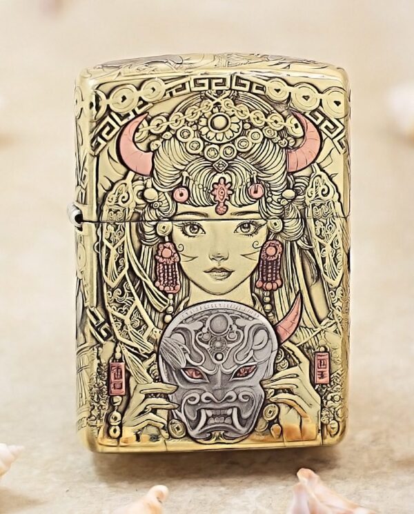 KZ501 Ornately engraved lighter with a woman's face above a gray demon mask held by her hands.