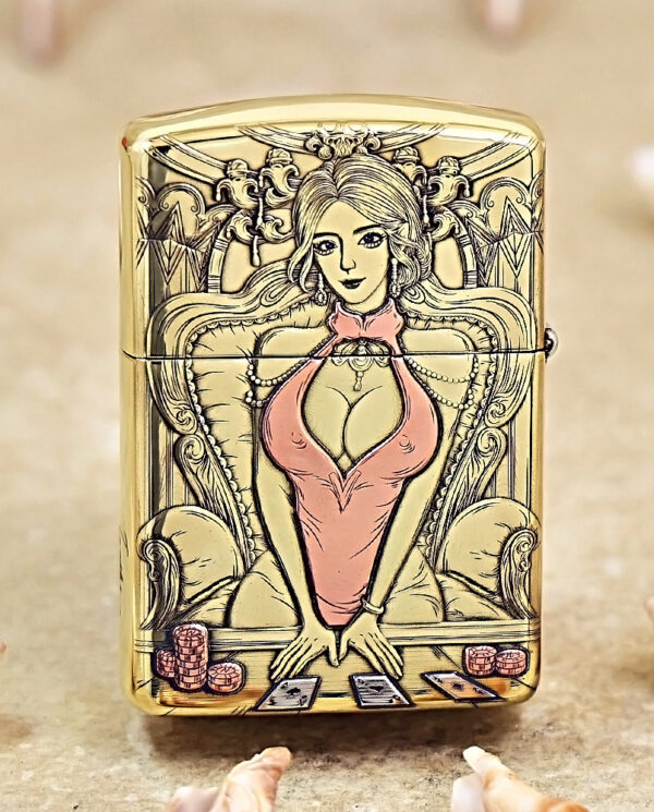 Gold decorative lighter featuring a stylized woman in a pink dress at a poker table with cards and chips.