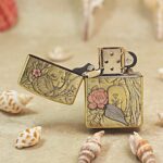 KZ509 five-side Flower Fairy lighter shown open with floral engraving