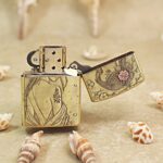 KZ509 floral engraved brass Zippo Armor lighter shown open from the reverse