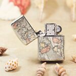 KZ554 mermaid and seashell engraved Zippo lighter shown open