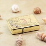 KZ555 mermaid engraving on the high-polish brass Zippo Armor lighter