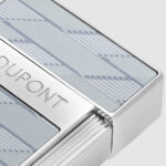 Close-up of grey Monogram 1872 pattern and silver S.T. Dupont logo on Biggy 025080