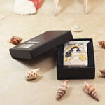 KZ370 Beach Beauty Zippo Armor lighter in an open presentation box