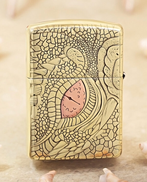 KZ371-01 Gold Zippo lighter with an embossed, reptile-scale pattern and a pink heart accent in the center.