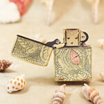KZ371 Dragon Eye engraved brass Zippo Armor lighter shown open from the front