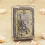 Metal lighter with an ornate Knights Templar engraving and decorative border on a beige surface