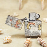 Open nine-tailed fox sterling silver Zippo Armor lighter showing the insert and engraved lid