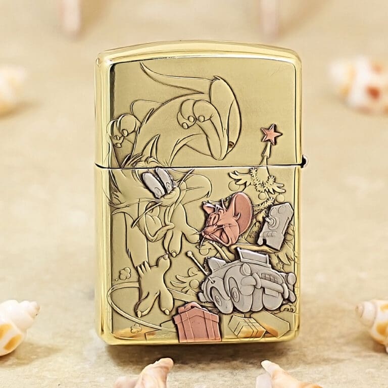 Gold Zippo lighter with an engraved cartoon scene showing a rabbit and a mouse among a toy tank and presents.
