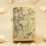 KZ117 high-polish brass Zippo Armor lighter with Tom and Jerry garden engraving