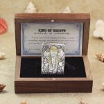 KZ127 elephant relief Zippo Armor lighter in an open wooden presentation box