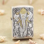 KZ127 silver-tone Zippo Armor lighter with elephant relief and gold-tone headdress