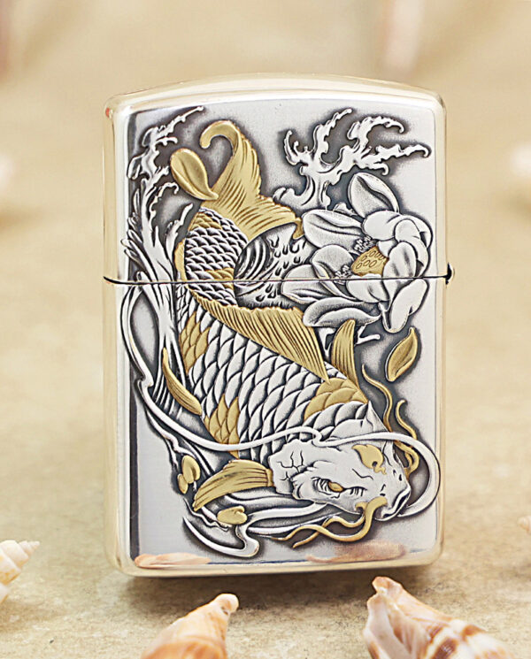 KZ136-01 Metal Zippo-style lighter with an embossed koi fish and floral design in gold and silver tones.