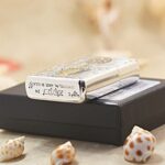 KZ148 engraved Buddha Zippo Armor lighter displayed on the original box