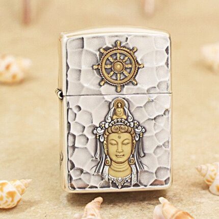 KZ148 silver-tone Zippo Armor lighter with gold-tone Buddha relief and wheel emblem