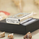 KZ186 cowgirl engraved Zippo Armor lighter, reverse and angled view