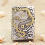 Close-up of the mythological figure engraving on the silver-tone Zippo Armor lighter