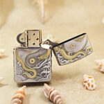 Open silver-tone Zippo Armor lighter showing additional figure engraving on the reverse