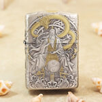 Silver-tone Zippo Armor lighter with engraved mythological figures and gold-tone accents