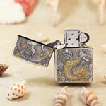 Open Mermaid Zippo Armor lighter showing the front fantasy artwork