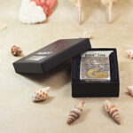 Open Mermaid Zippo Armor lighter presented beside the original box