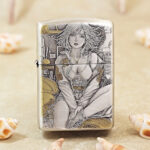 Silver-tone Motorbike Girls Zippo Armor lighter with engraved artwork and gold-tone accents