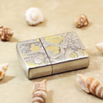 Angled view of the Golden Hairpin Beauty Zippo Armor lighter