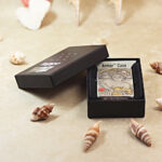 Open Scent of a Woman Zippo Armor lighter presented beside the original box