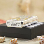 Geisha and Dragon Zippo Armor lighter displayed with its black Zippo box