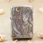 Silver-plated Zippo Armor lighter with Tang Dynasty-inspired engraving and gold inlay