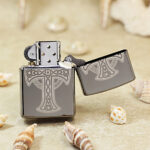Zippo 48614 Black Ice Celtic Cross lighter side knotwork view